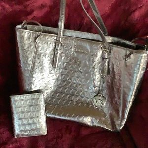 Michael Kors jet set travel zip multi functional bag